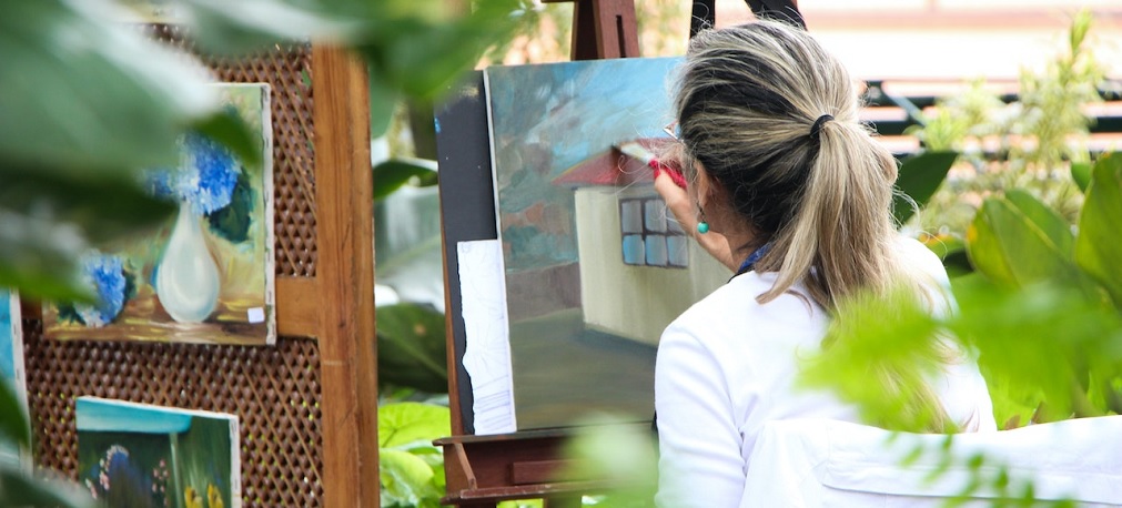 a woman painting Painting.jpg