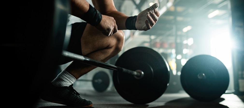 a man preparing to deadlift