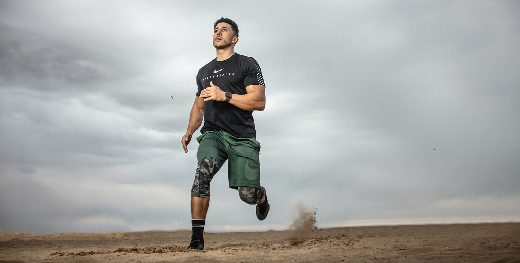 a man running at the beach