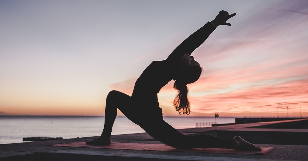 a woman in a yoga pose