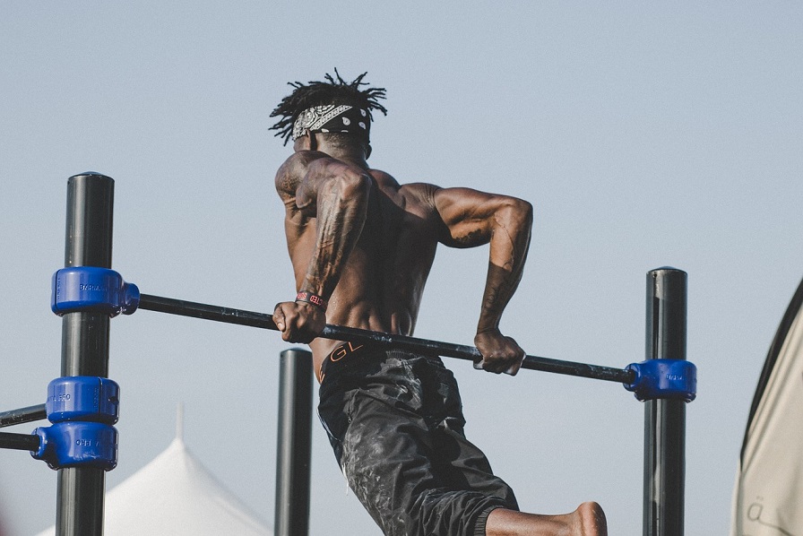 a man engaged in dips